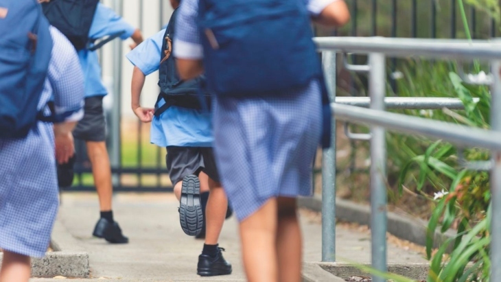 School kids running