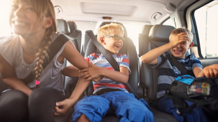Kids laughing in the back of the car
