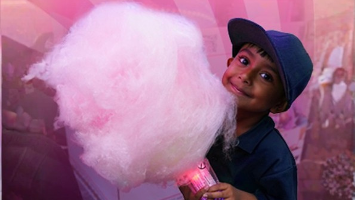 Boy with huge fairy floss at The Sweet Spot at The Ponds