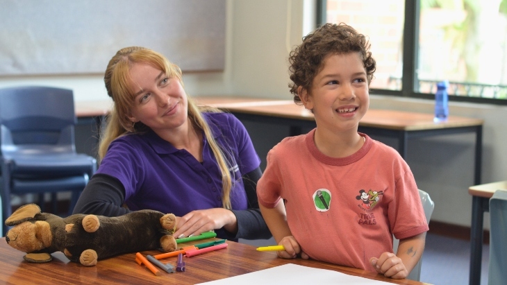 Child and teacher at Speaking Schools Australasia Public Speaking Workshop
