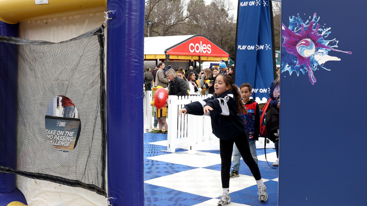Girl playing at AFL Footy Fest Melbourne 2026