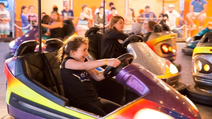 Girl on Dodgem Cars at Frequency Carnival & Circus