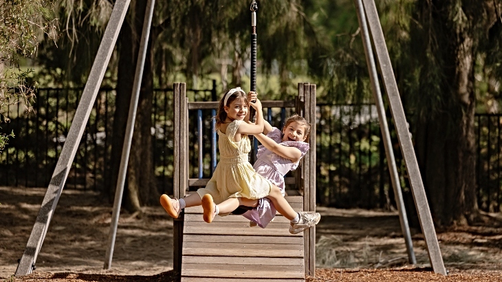 Kids on a swing at Australian Botanic Garden Mount Annan