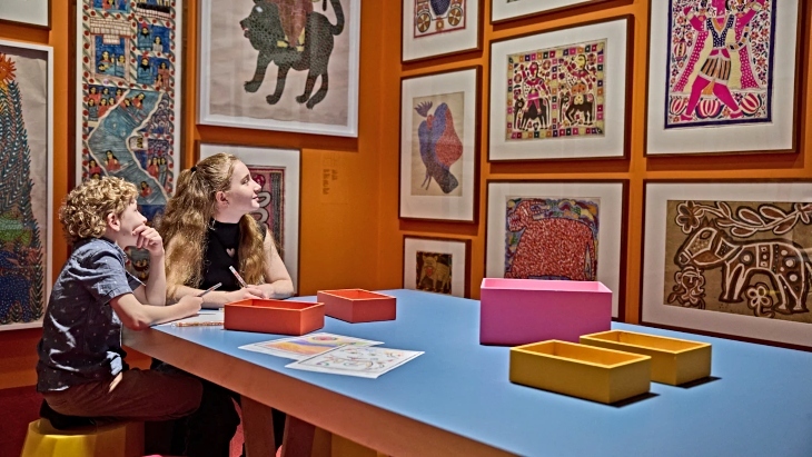 Kids taking part in a drawing activity in the AGNSW Elemental exhibition