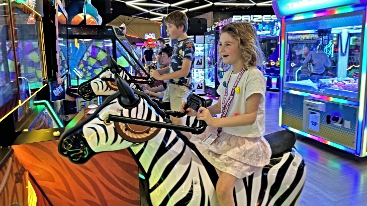A family having fun at Timezone.
