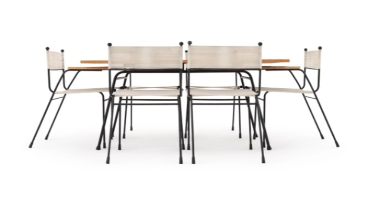 Six chairs made from white cord and black steel around a dining table