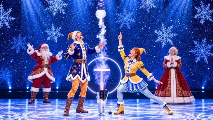 Performers on stage doing bubble magic 