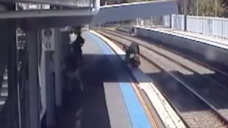 Pram on train tracks cctv footage