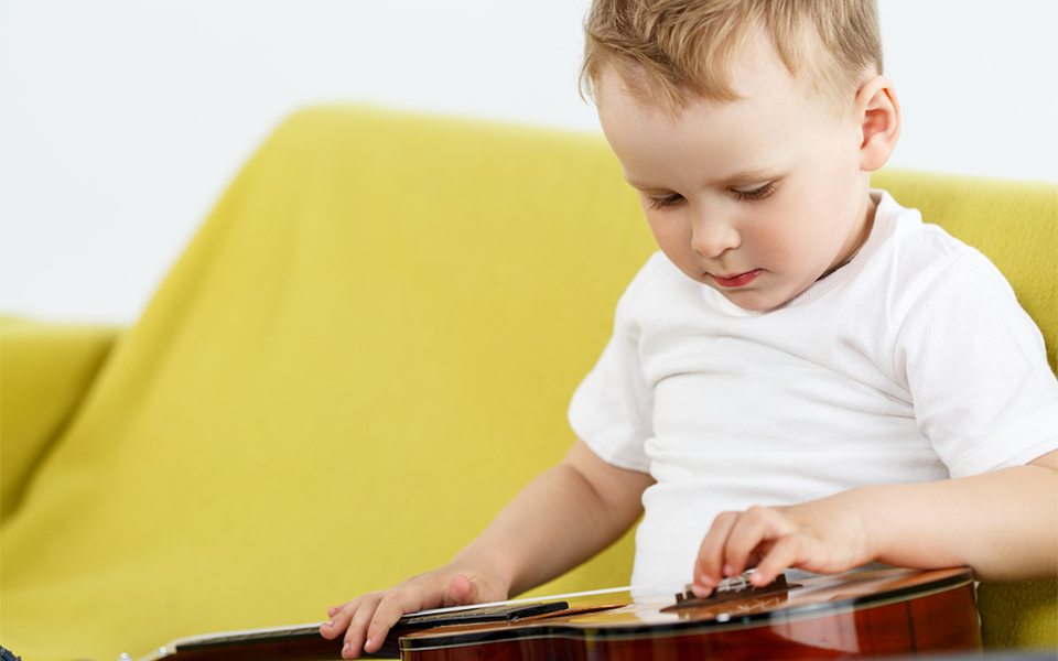 Young Boy & Ukulele