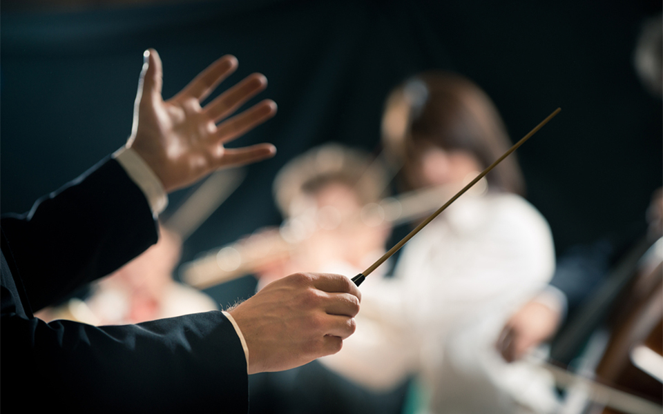 Orchestra Conductor On Stage
