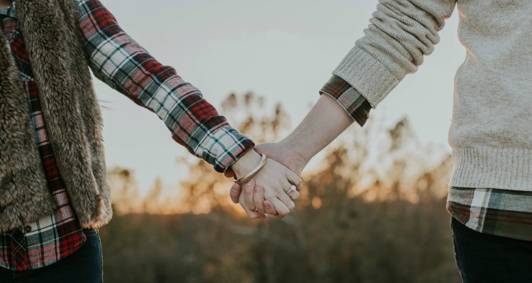 couple holding hands